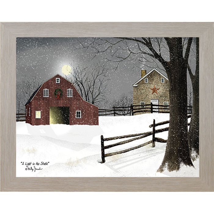 Monte Carlo framed landscape Billy Jacobs wall art print of a red barn with a Christmas wreath and glowing door on a moonlit snowy night with a stone farmhouse and split rail fence titled "A Light in the Stable"