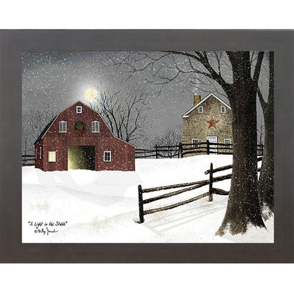 Slatewood framed landscape Billy Jacobs wall art print of a red barn with a Christmas wreath and glowing door on a moonlit snowy night with a stone farmhouse and split rail fence titled "A Light in the Stable"