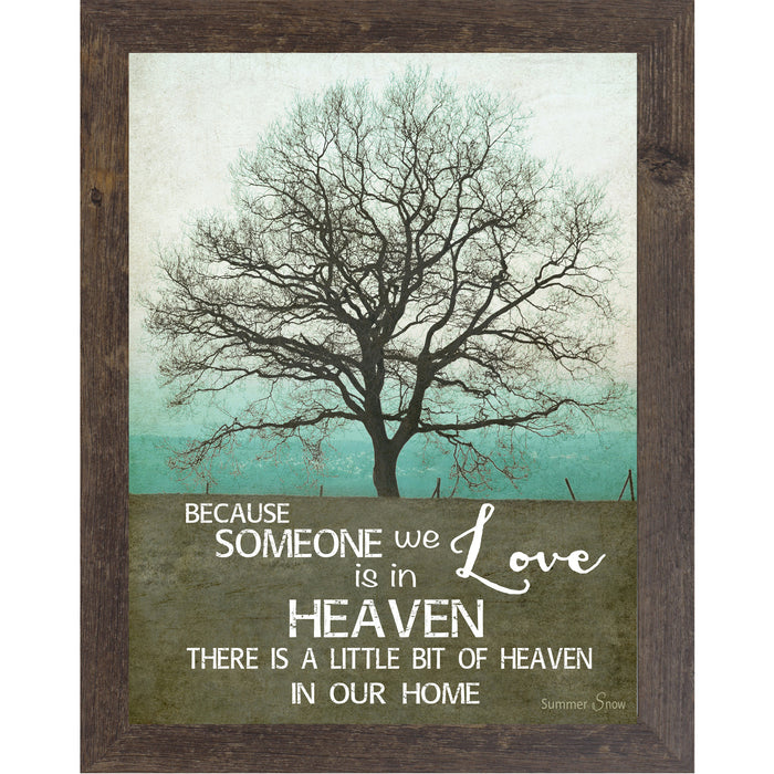 Sympathy memorial wall art featuring a solitary tree on a hillside beneath a teal sky with the words Because someone we love is in heaven there is a little bit of heaven in our home