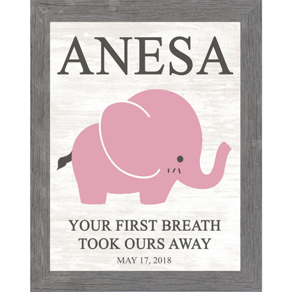 Gray framed personalized pink elephant nursery wall art with bold baby name at top and the words Your First Breath Took Ours Away with birth date on soft white shiplap background — PER149