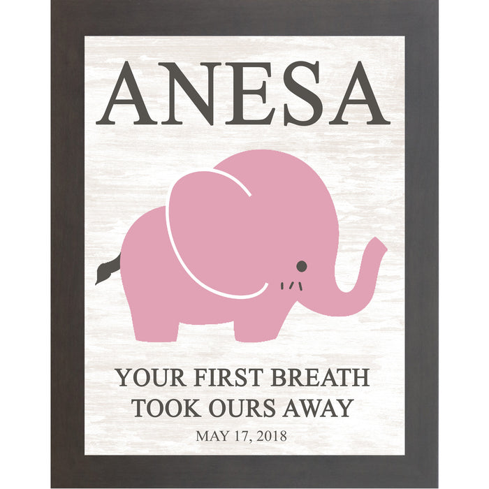 Slatewood framed personalized pink elephant nursery wall art with bold baby name at top and the words Your First Breath Took Ours Away with birth date on soft white shiplap background — PER149