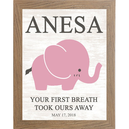 Farmtable framed personalized pink elephant nursery wall art with bold baby name at top and the words Your First Breath Took Ours Away with birth date on soft white shiplap background — PER149